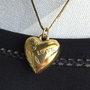 Gold heart & love charm on gold necklace